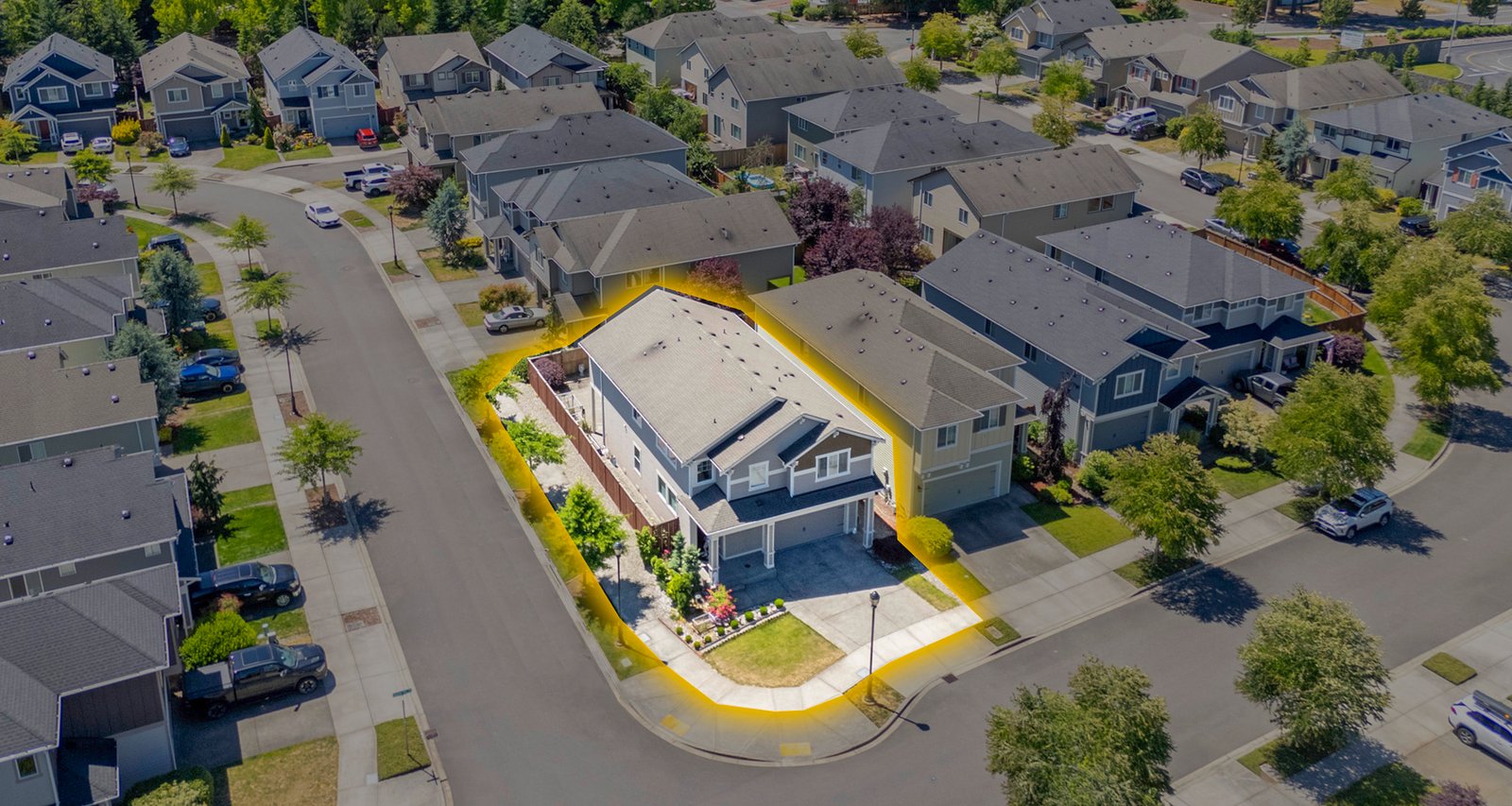 Aerial view of home and neighborhood
